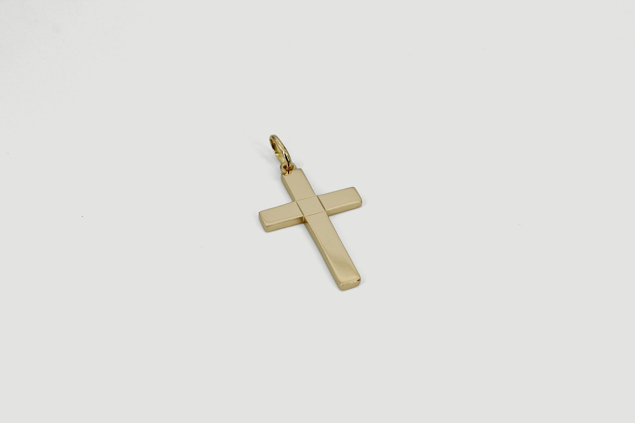Cruz de oro de 18k