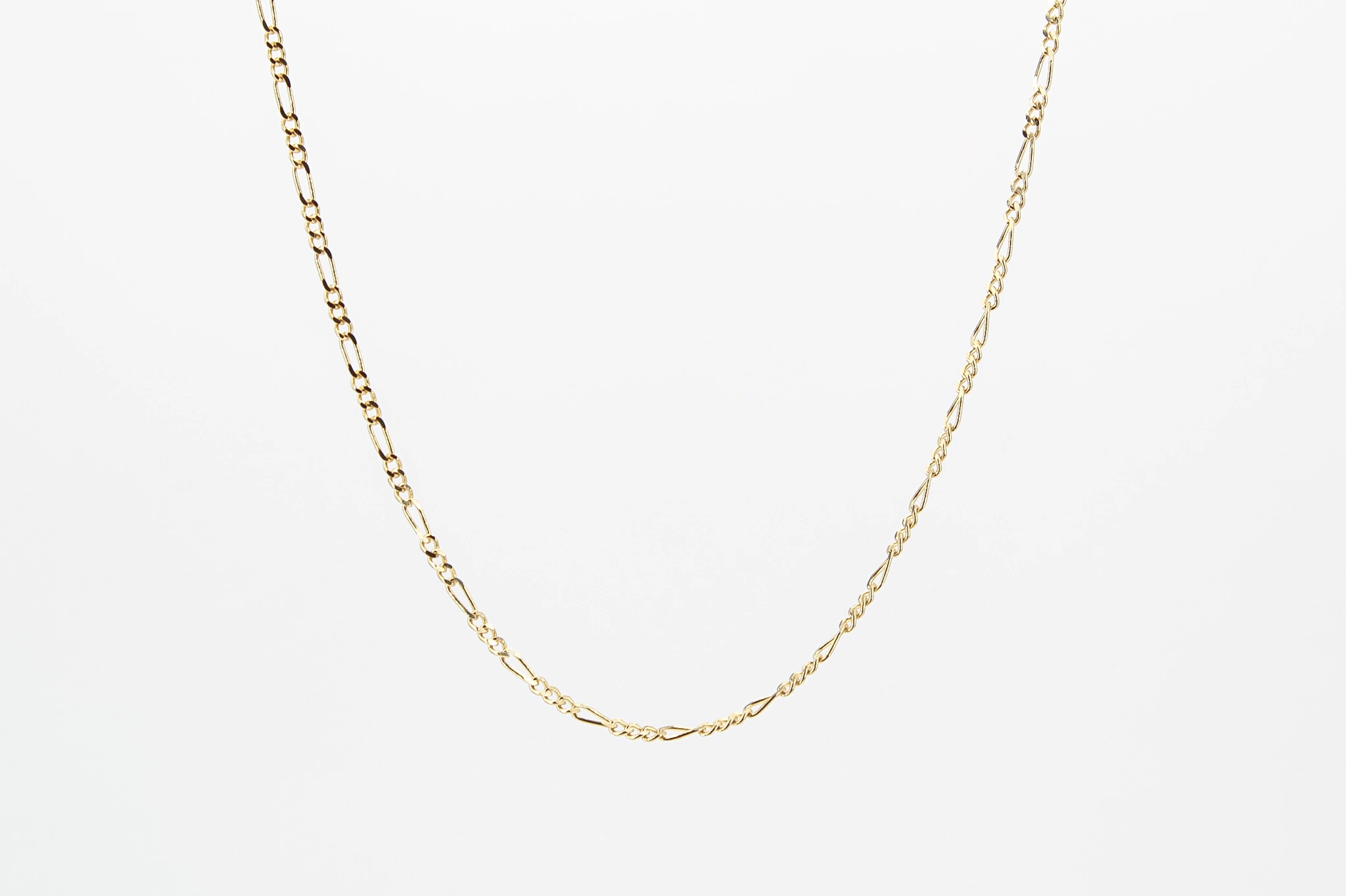 Cadena Figaro de oro 18K