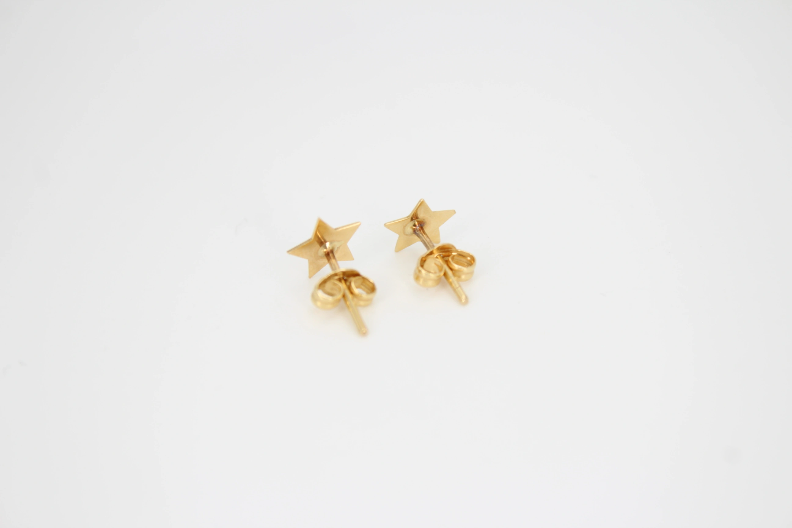 Pendientes de oro de 18k con forma de estrella de cinco puntas — foto 2