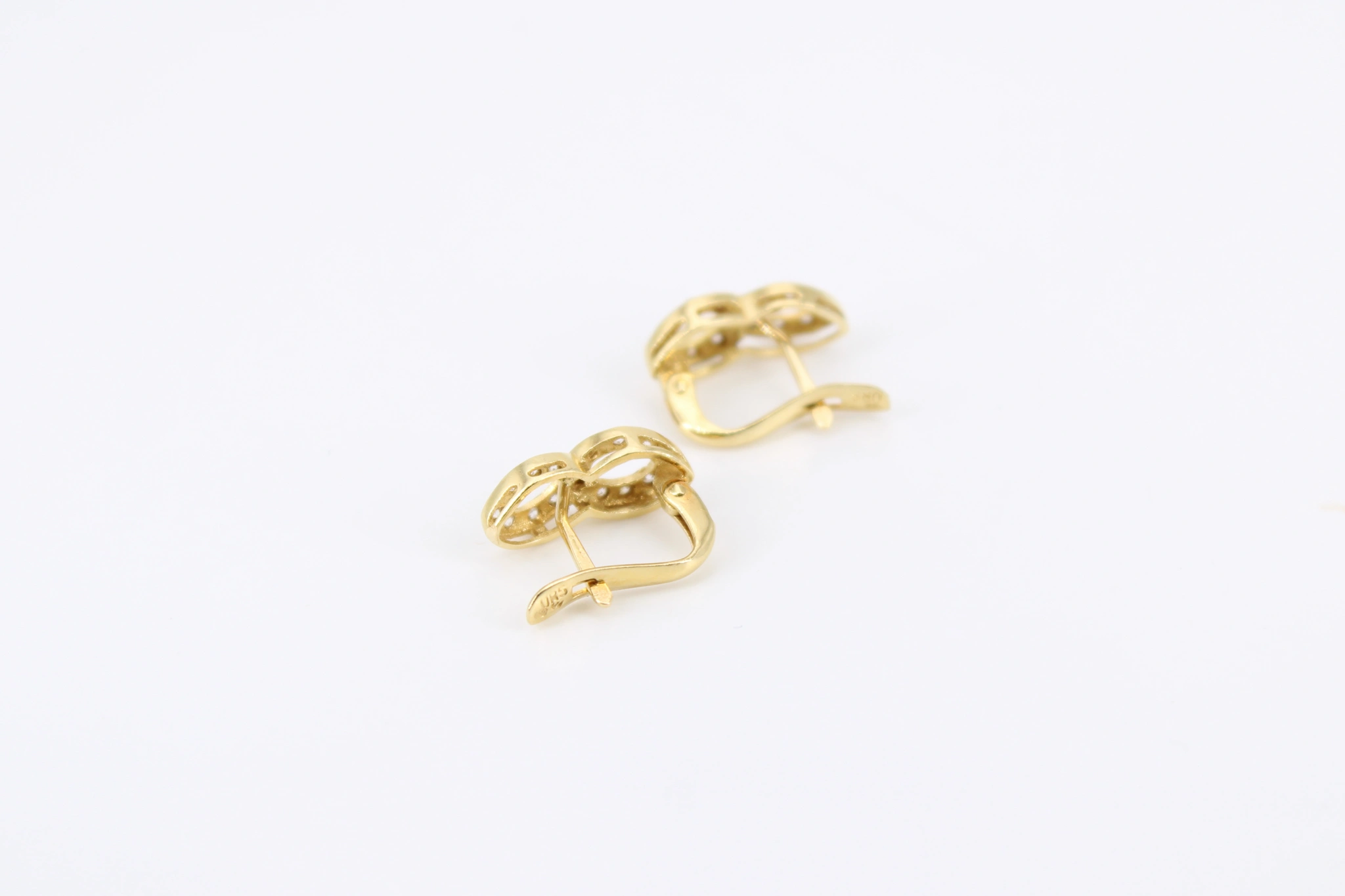 Pendientes de oro 18k con infinito y circonitas — foto 2