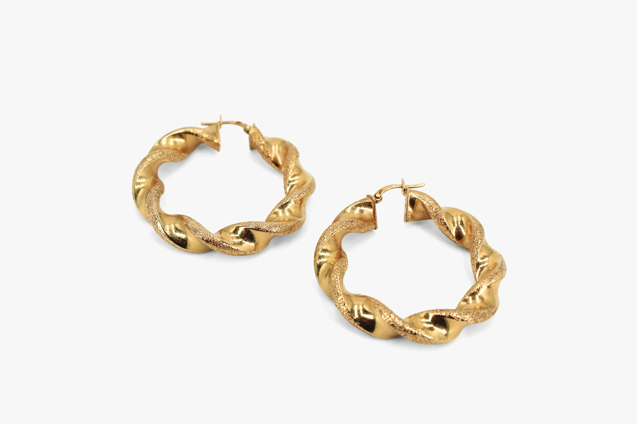 Aros de oro 18k trenzados